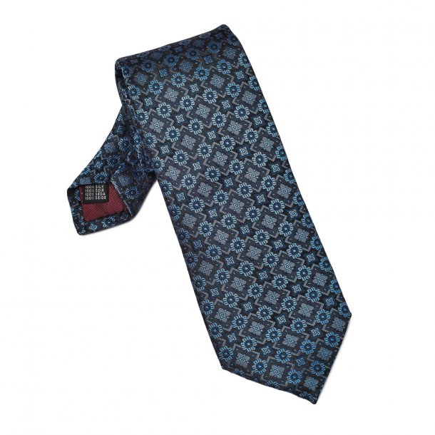 Granatowy krawat jedwabny w jaśniejszy niebieski wzór